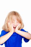 boy with long blond hair in blue top laughing - isolated on white
