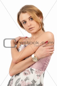 young woman standing with folded hand against white background