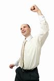 Excited handsome business man with arm raised