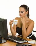 Young business woman holding a cup of coffee