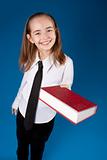Little girl giving a book