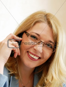 Businesswoman speaking by mobile phone