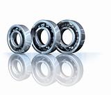 Ball bearings on reflective background isolated