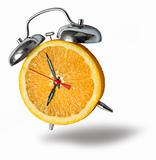 Orange alarm clock ringing