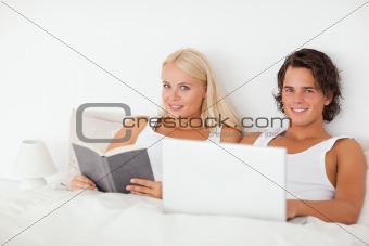 Young couple in their bed