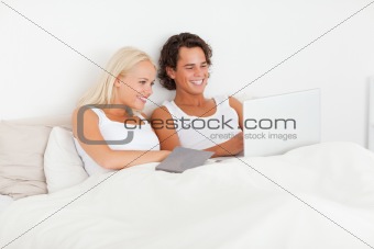 Lovely couple in their bed