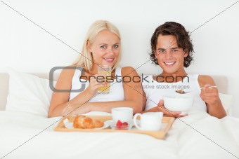 Lovely couple having breakfast