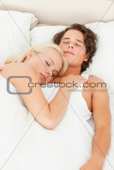 Portrait of a cute couple sleeping