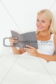 Portrait of a woman with a book