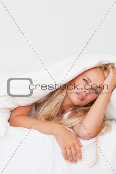 Portrait of a woman waking up