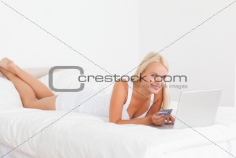 Gorgeous woman purchasing online