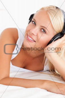 Portrait of a quiet woman enjoying some music