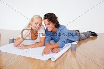 Young couple looking at a plan