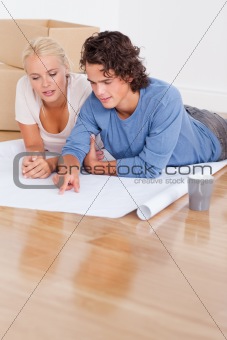 Portrait of a cute couple getting ready to move in a new house