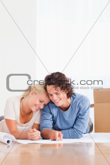 Portrait of an in love couple organizing their new home