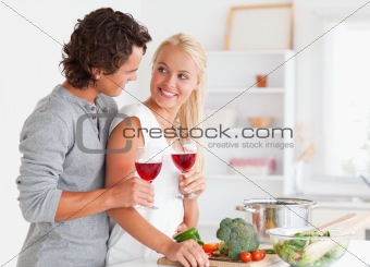 Couple having a glass of red wine