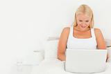 Beautiful blonde woman using a laptop