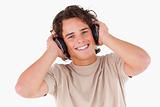 Smiling man with headphones looking into the camera