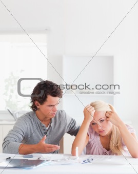 Man trying to comfort his wife