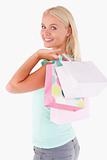Close up of a Joyful woman with some shopping bags