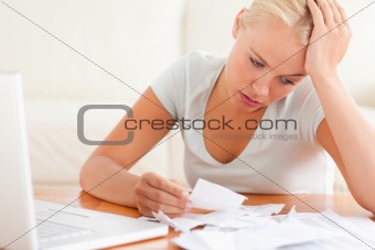 Despaired woman accounting
