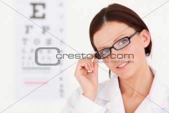 A female optician with glasses 