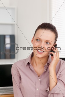 Businesswoman using a phone