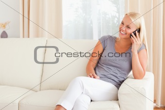 Laughing woman on the phone