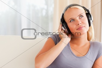 Close up of a woman listening to music