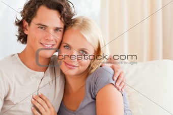 Lovely couple sitting on a couch