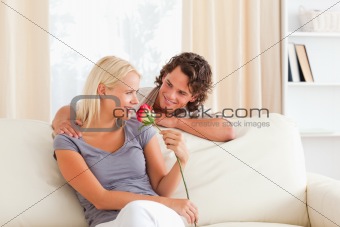 Cute couple with a flower