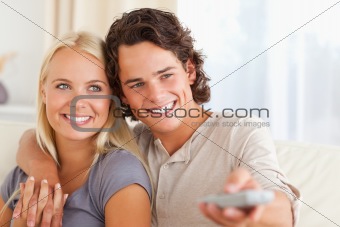 Close up of a couple watching TV