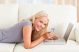 Smiling woman purchasing online
