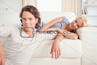 Couple posing in their living room