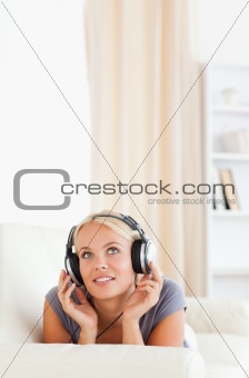 Portrait of a woman listening to music
