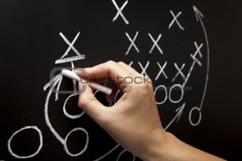 Man drawing a game strategy