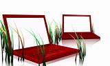 red designer laptops and grass
