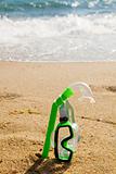 Snorkel and mask in sand