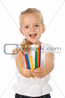 Happy little girl with color pencils