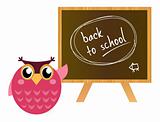 Pink Owl showing "back to school" sign on black board
