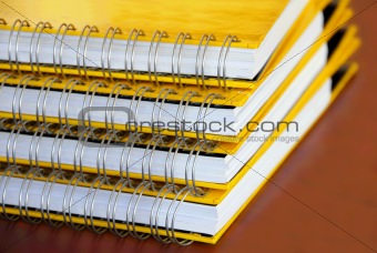 Yellow notebooks stack