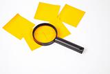 a magnifying glass hovering over the post-it Inspection