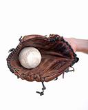 hand holding a baseball glove with the ball in it - isolated on white