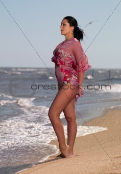 woman standing on the beach