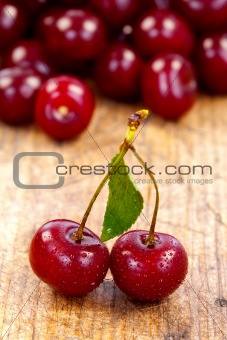 Cherries on rustic table