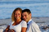 Young happy couple at beach