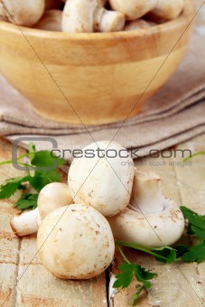 mushrooms  champignon  on a wooden table