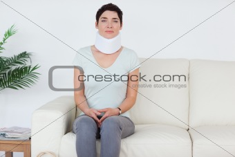 Sad Woman with a surgical collar
