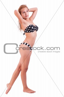 young woman wearing swimsuit isolated on white background, studio shot