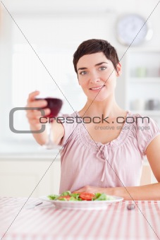 Gorgeous Woman toasting with wine